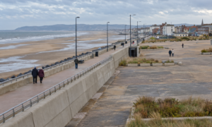 AI-generated coastal regeneration illustration, inspired by Rhyl; not a photograph of the site or an approved redevelopment design.